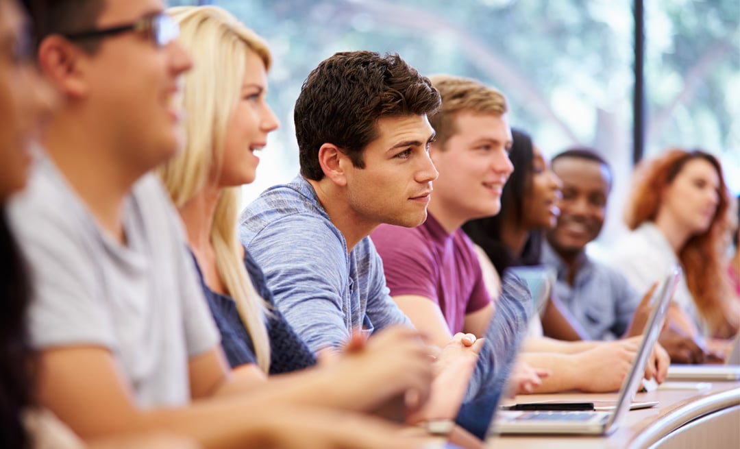 students at college with laptops