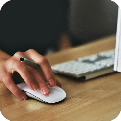 person using keyboard and mouse